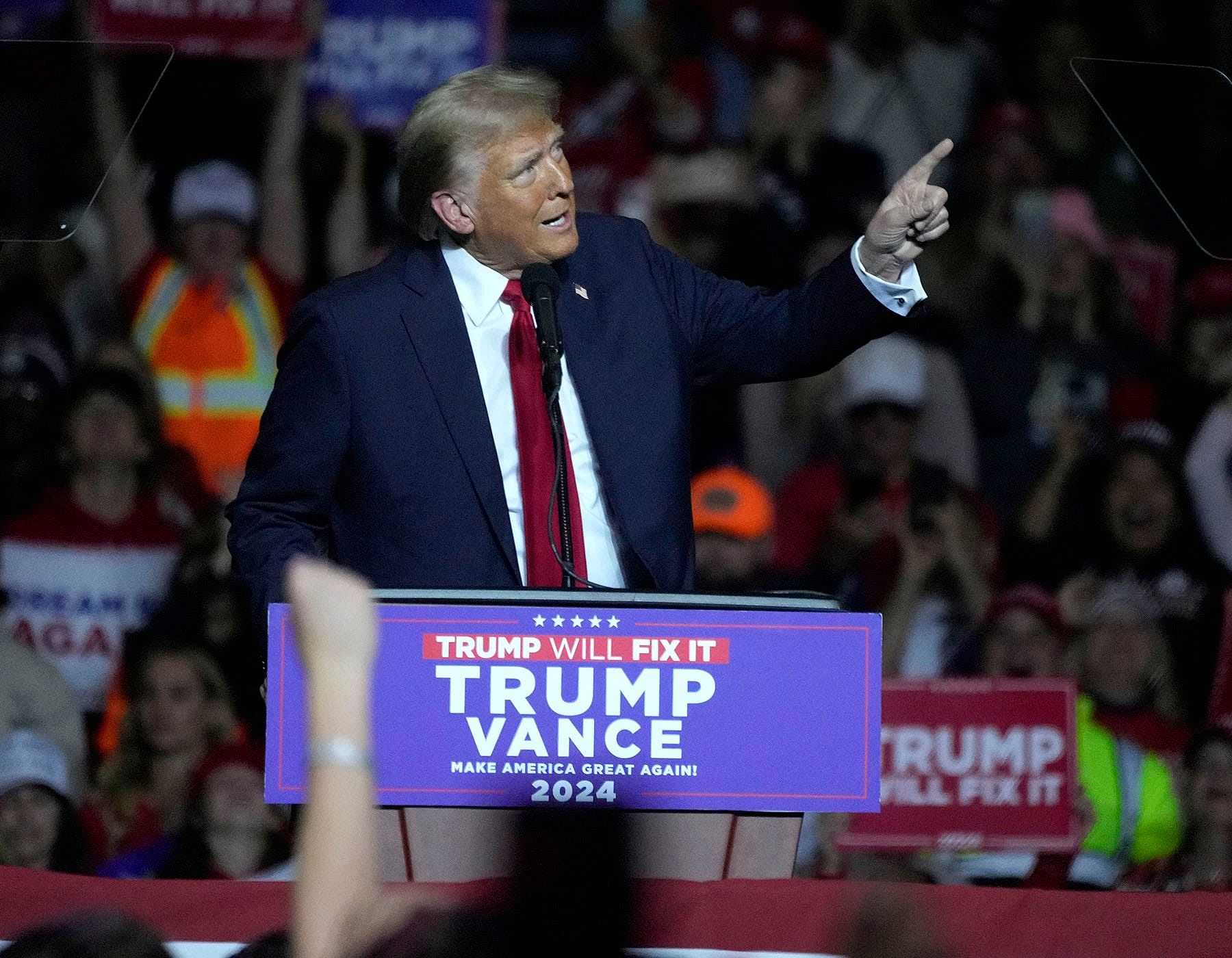 WATCH: Donald Trump shows off his golf swing mid dance at Presidential campaign rally